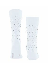 Weiße Baumwollsocken mit einem Pünktchenmuster in kleinen braunen und rosa Punkten, mit einer glatten Textur und einem gerippten Bündchen.