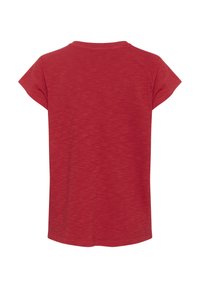 Červené tričko s krátkým rukávem a kulatým výstřihem, s texturovaným heather povrchem a volným střihem.