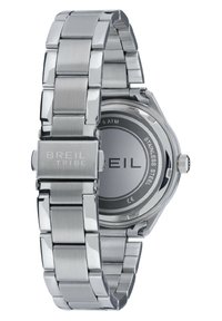 Montre en acier inoxydable avec un bracelet en argent. Présente un boîtier rond, un bracelet texturé et le nom de la marque gravé sur la boucle. Étanche jusqu'à 5 ATM.