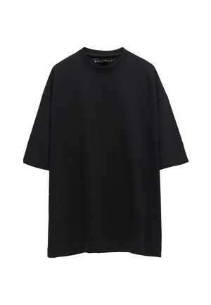 Black oversized t-shirt made from soft cotton fabric. Features a crew neck, short sleeves, and a straight hem without any patterns or graphics.