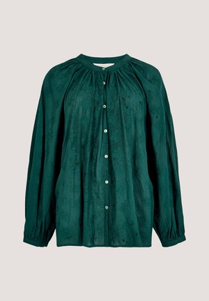 Grüne Bluse mit Knopfverschluss, rundem Halsausschnitt, gerafften Details, langen Ärmeln und dezentem Blumenmuster auf weichem Textilgewebe.