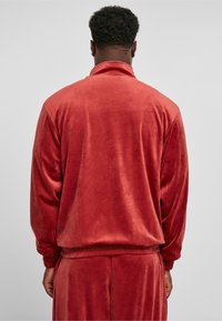 Karl Kani Giacca da mezza stagione - dark red