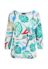 Bloemtop met een witte basis en kleurrijke groene, blauwe en rode patronen. Ronde halslijn en driekwart mouwen. Lichtgewicht stof.