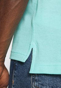 Tommy Hilfiger REGULAR - Polo - miami aqua