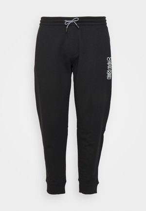 MIRRORED LOGO - Tracksuit bottoms - black