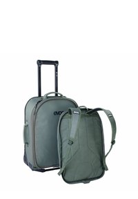 Set di borse da viaggio verdi, comprendente una valigia con ruote e manico retrattile e uno zaino staccabile con spallacci regolabili.