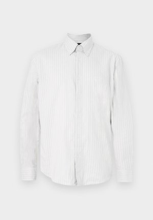 White long-sleeve button-up shirt with thin vertical gray stripes and a pointed collar against a white background.