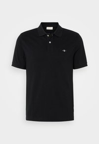 - Koszulka polo