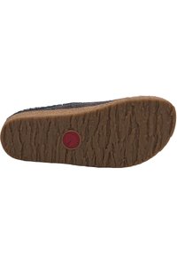 Shoe sole with textured brown rubber, featuring a red circular logo and a patterned finish, designed for grip and stability.