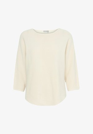 Kremo spalvos mezginis viršus su laisvu siluetu, apvaliu kaklu ir trijų ketvirčių rankovėmis. Pasižymi subtilia briaunota tekstūra visame paviršiuje.