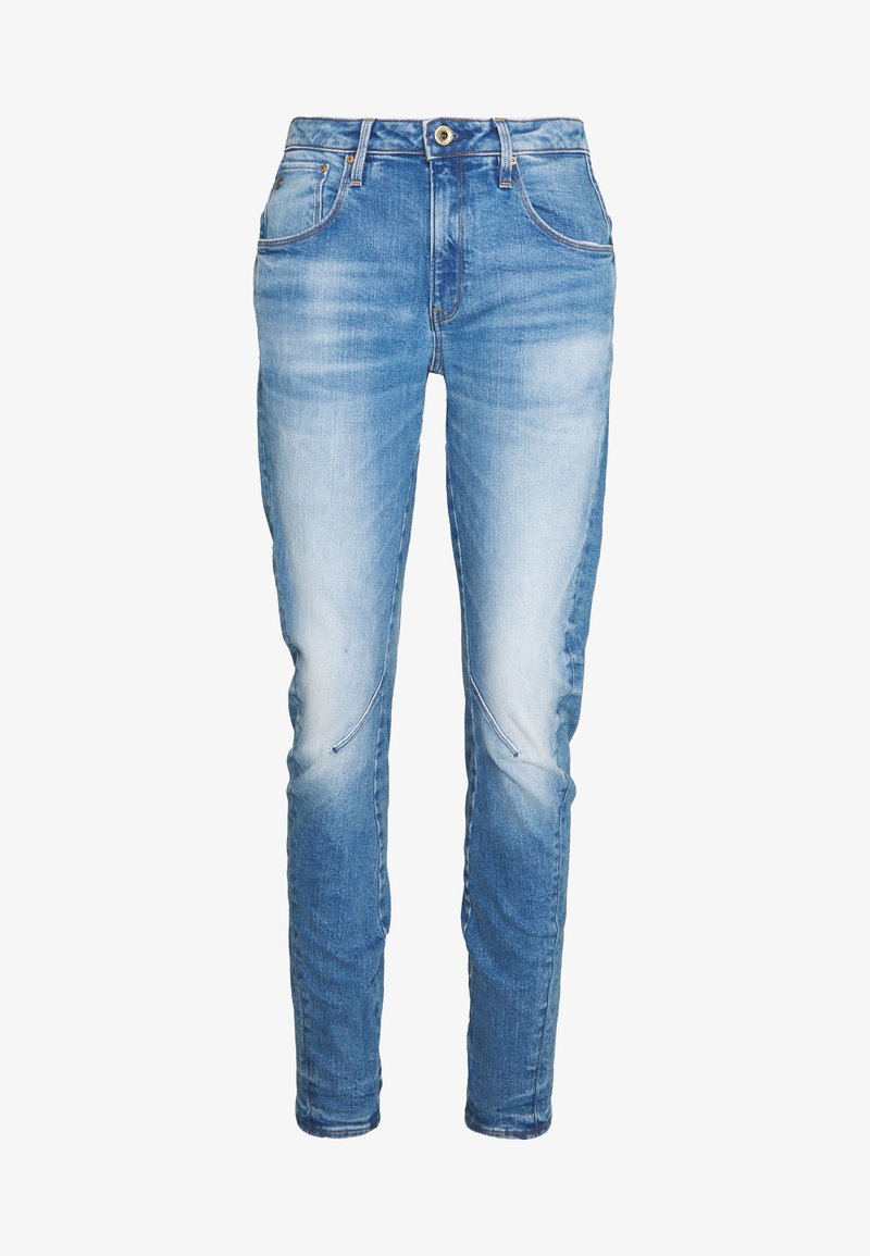 Jeans in denim bluastro sbiadito con tasche frontali, chiusura con bottone e dettagli delle cuciture visibili nella zona del ginocchio.