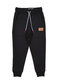Schwarze Sweatpants aus weichem Stoff mit einem Kordelzugbund und kontrastierenden weißen und roten Details sowie einem Lederlogo-Patch.