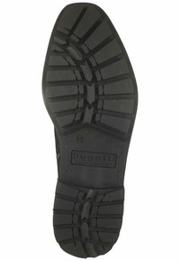 Sort gummisål med et struktureret grip-mønster, der har en rund tå og et brandmærke præget på hælområdet.