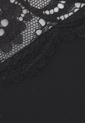 Black lingerie with intricate lace detailing at the top, featuring a smooth fabric beneath and a scalloped lace edge for added texture.