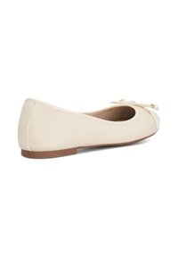 Beige leather ballet flats with a rounded toe, lightweight design, and a small accent bow on the front; flat brown sole.