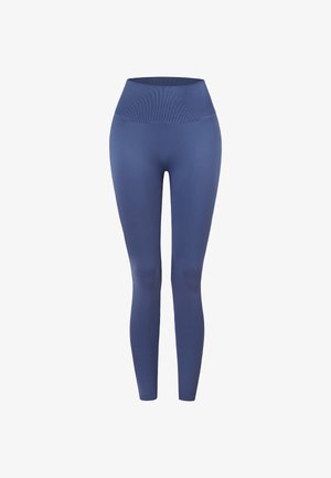 Wysokie, bezszwowe niebieskie legginsy z szerokim prążkowanym pasem, dopasowane na przylegający krój i pełną długość.