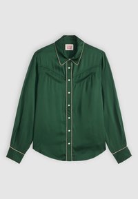 Grüne satinierte Langarmbluse mit spitzen Kragen, elfenbeinfarbenen Paspeln, zwei Brusttaschen und weißen Knöpfen. Glatte Textur mit polierter Oberfläche.