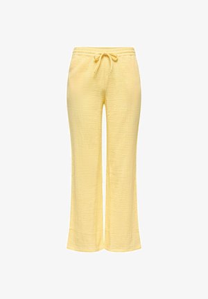Šviesiai geltonos tekstūruotos audinio kelnes su elastine juosta ir raišteliu, tiesaus kirpimo.