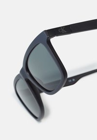 Calvin Klein Jeans UNISEX - Ochelari de soare - matte black