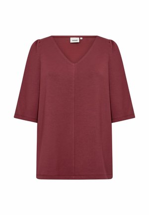 Viininpunainen V-kaula-aukollinen toppi, jossa on lyhyet hihat ja pehmeä kangas; siinä on suora leikkaus ja hienovarainen pussitus hartiasaumoissa.