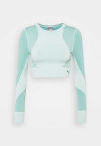 Heller mintgrüner, langärmliger Cropped-Top mit strukturierten, Mesh-Einsätzen und glatten Kanten. Verfügt über einen runden Ausschnitt und ein Logo-Highlight.