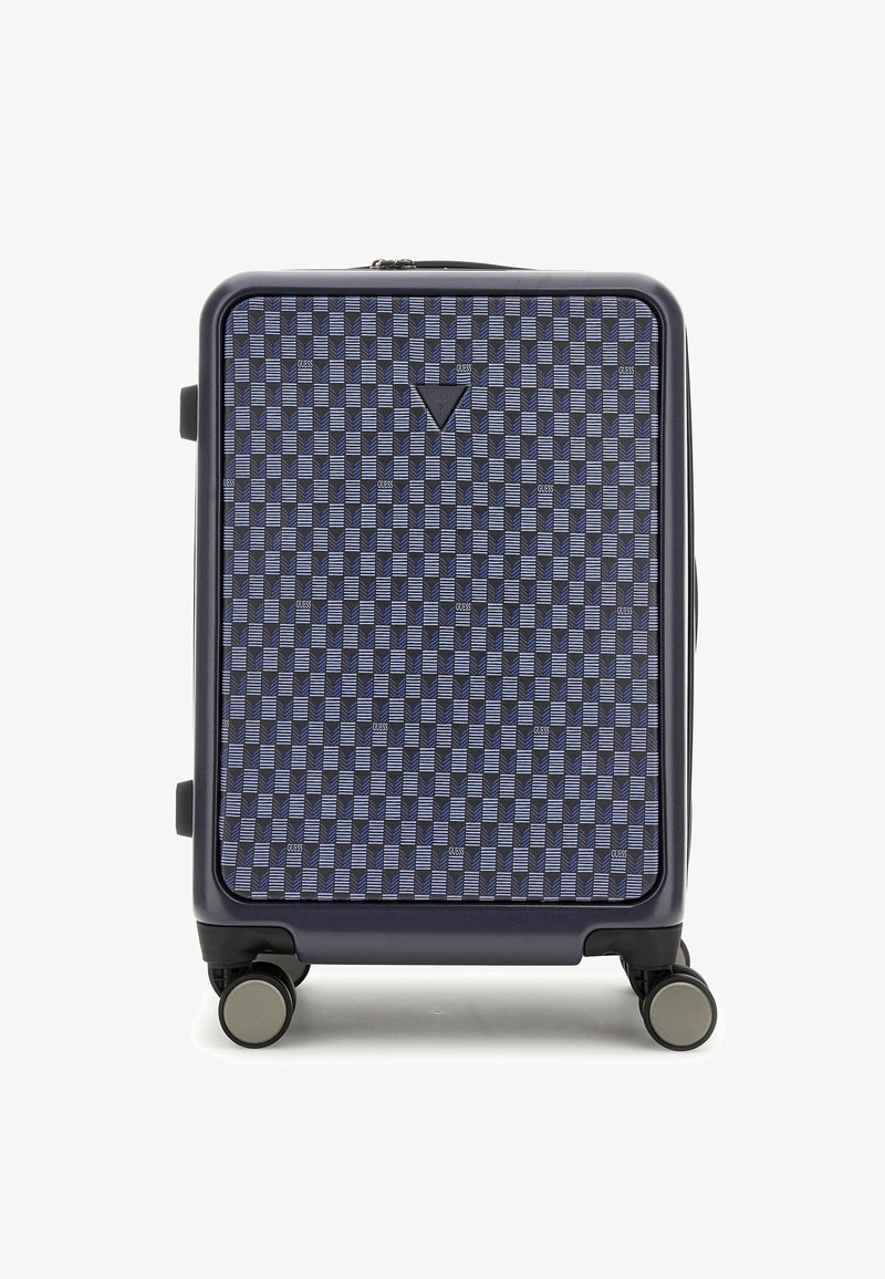 Valise rigide de couleur bleu marine foncé avec une surface à motif de carrés entrelacés en bleu. Dispose d'une poignée supérieure et de quatre roulettes multidirectionnelles.