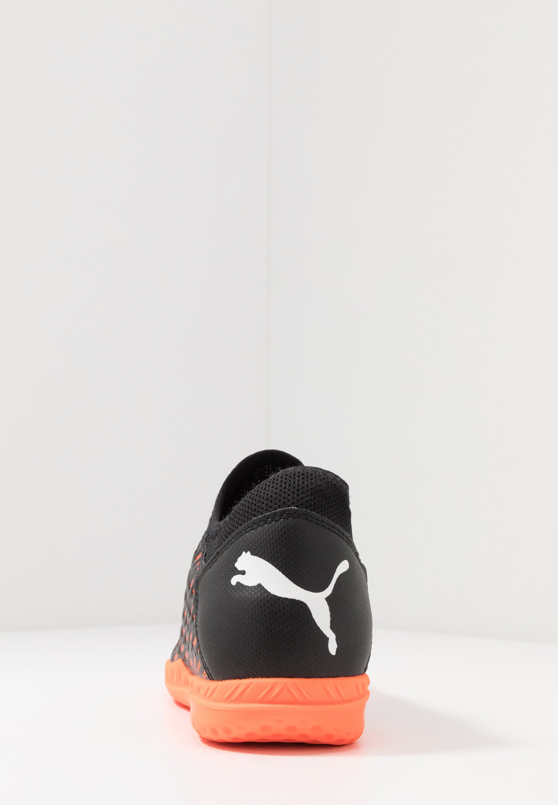 orange black and white pumas