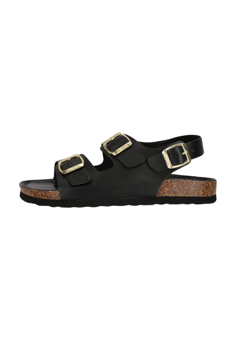 Svarta sandaler med tre justerbara remmar, gyllene spännen och en korkliknande mellansula. Texturerad gummiyttersula för grepp och komfort.