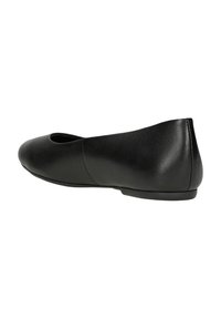 Black leather ballet flat with a rounded toe, smooth texture, low heel, and minimal stitching detail. Side view showcases sleek design.