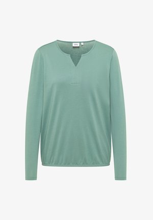 Długi rękaw bluzki w miękkim, jasnoszarym materiale z dekoltem w kształcie litery V, z przeszyciem wokół dekoltu i luźnym, swobodnym kroju.