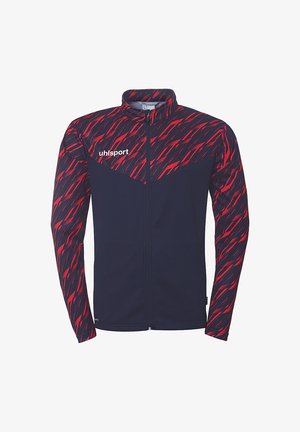Marineblauwe jacket met abstract rood patroon op de mouwen, volledige rits, hoge kraag en 'uhlsport' logo op de borst. Soepele textuur, atletische pasvorm.