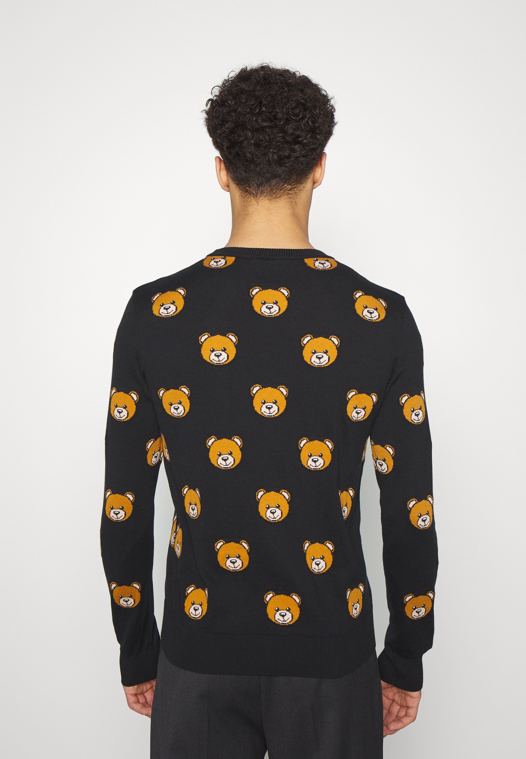 black moschino sweater