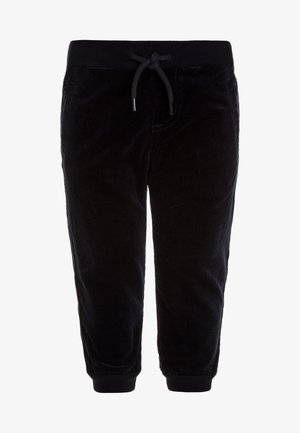 Czarne spodnie sztruksowe dla malucha z elastycznym paskiem w talii, sznurkiem do wiązania, przednimi kieszeniami i prążkowanymi ściągaczami przy kostkach.
