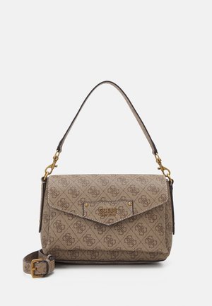 Beige Guess shoulder bag with logo pattern, gold-tone hardware, flap closure, and detachable adjustable strap on white background.