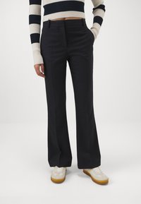Tommy Hilfiger CORE FLARED PANT - Püksid - dark blue