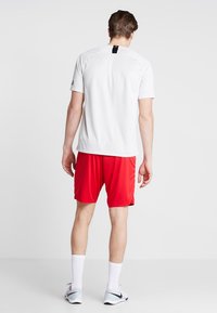 JAKO MANCHESTER 2.0 - Korte broeken - rot