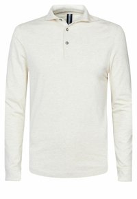 Long-sleeve polo shirt in light beige, featuring a collar, three-button placket, and a soft texture with a subtle heather pattern.