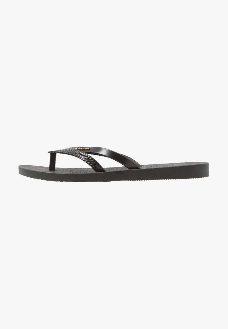 Black flip-flop made of rubber with textured sole, dual strap design featuring one braided accent, and a small logo detail.