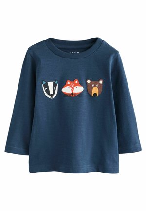 Jūras spēku garajiem piedurkņu krekliem ar izšūtām dzīvnieku sejām: ūdri, lapsa un lācis. Mīksta kokvilnas auduma materiāls ar apaļu kakla izgriezumu un gludām šuvēm.