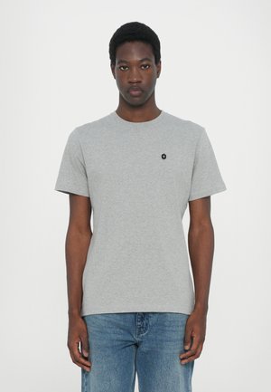 Gray short-sleeve T-shirt made of cotton, featuring a round neck and a small black logo on the left side of the chest. Classic fit and texture.