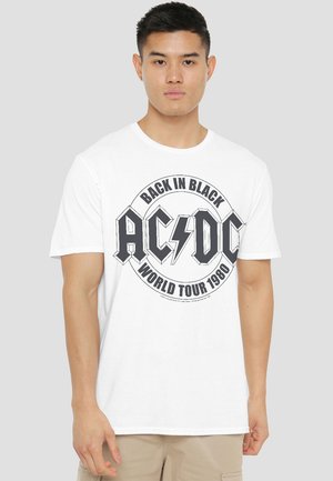 Weißes Baumwoll-T-Shirt mit einem großen schwarzen AC/DC "Back in Black World Tour 1980" Grafik auf der Vorderseite, mit runden Designelementen.
