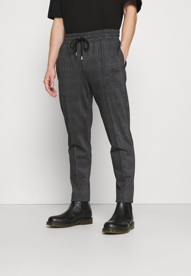 CHECK JOGGER - Trainingsbroek - black