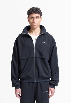 STUDIO REVERSIBLE TRACK - Sweatjacke - black