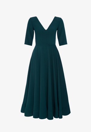 Tunika midi w kolorze teal, z dekoltem w kształcie litery V, dopasowanym gorsetem i rękawami do łokcia. Rozkloszowana spódnica z plisami i gładką fakturą.