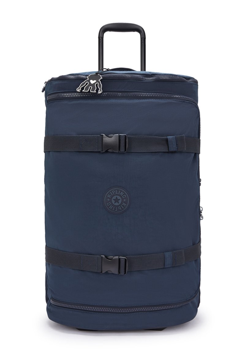 Navy fabric travel backpack with retractable handle, zippered compartments, and adjustable straps. Features a logo patch and smooth texture.
