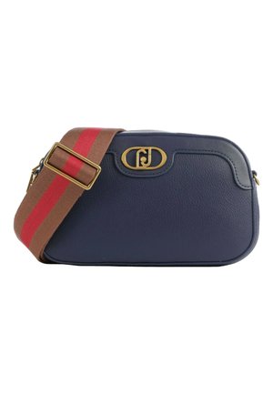 Sac à bandoulière en cuir navy avec quincaillerie dorée, sangle marron avec des rayures rouges, et une forme rectangulaire arrondie. Détail du logo au centre.
