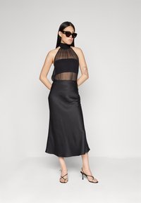 DRYKORN NEVIDA - Maxi skirt - black