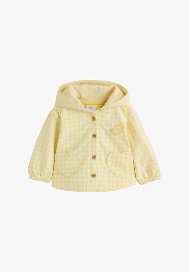 Veste en vichy jaune avec capuche, boutons en bois, détail citron brodé et poches en forme de cœur. Tissu doux avec poignets élastiqués.