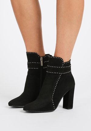 Stivaletti con tacco - black