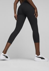 Puma Legingi - black